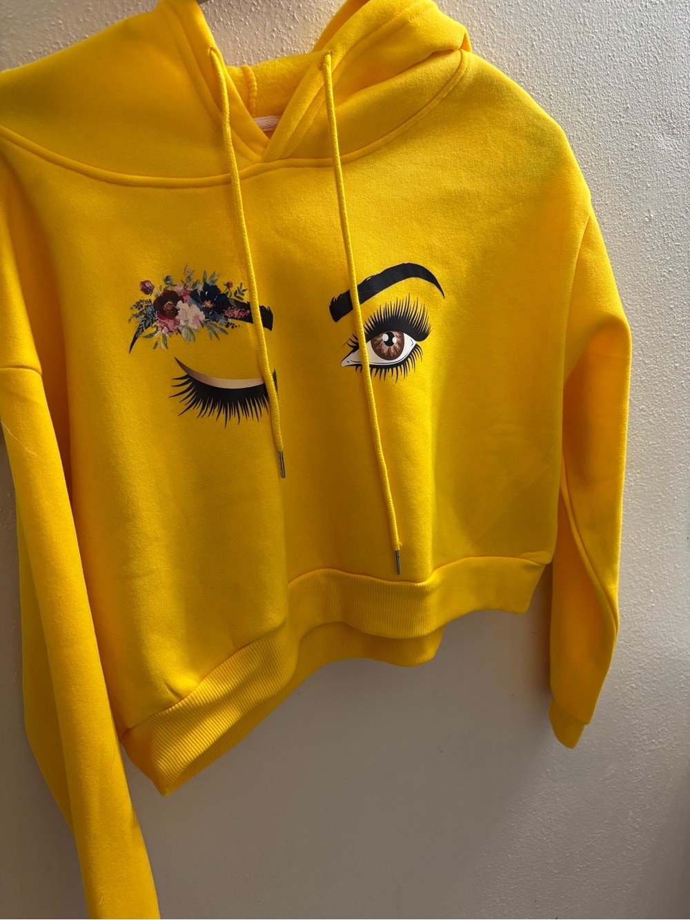 Yellow Cropped Hoodie with Floral Eye Graphic